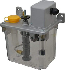 Trico - 2 L Reservoir Capacity, 3 - 6 cm Output per Cycle, 6-12 cm Output per Hour, Electric Central Lubrication System - 30 Min Interval Between Cycles, 130mm Wide x 225mm High, 110 Volts, Oil, 5/16-24 Outlet Thread - Strong Tooling